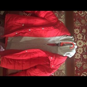 red jacket grey under coat